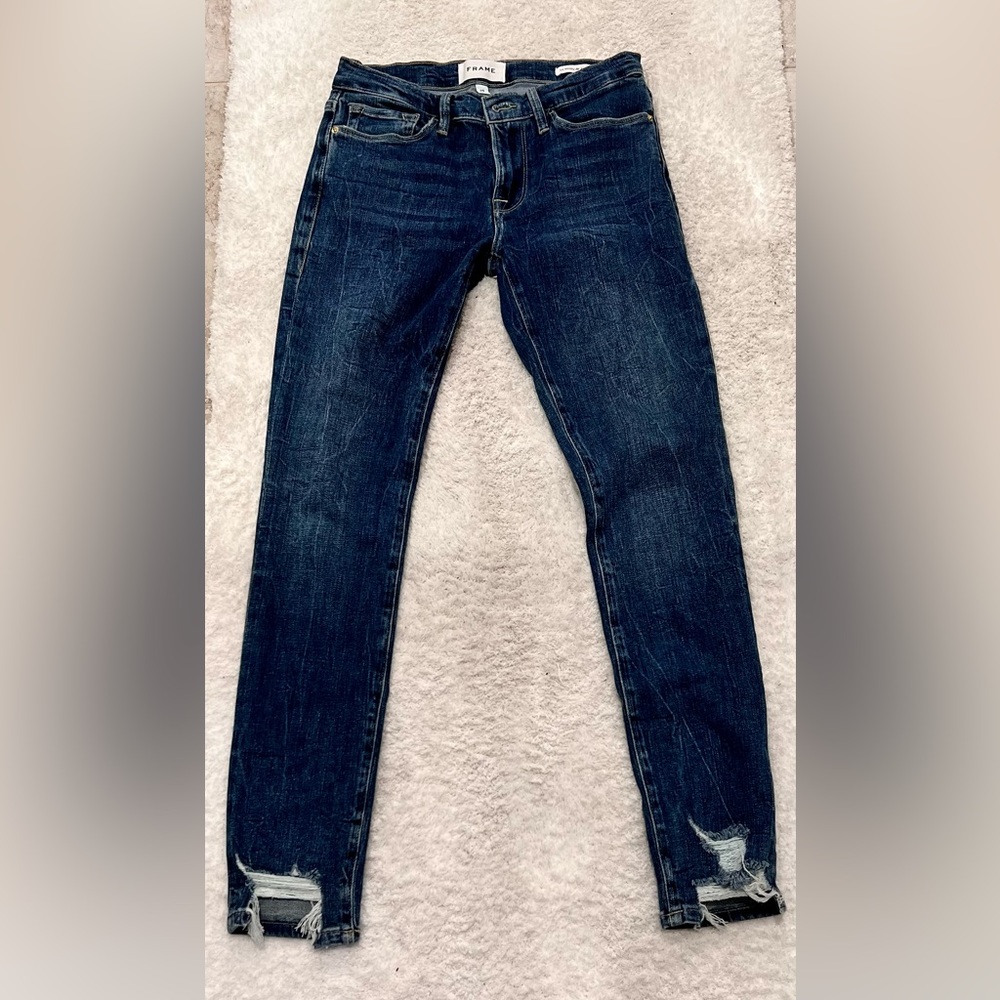 Frame denim Jeans with frayed bottom.  Size 25 Style: Le Skinny de Jeans
